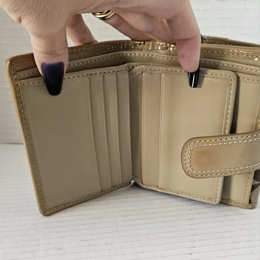 Coach Signature bi‎ fold wallet